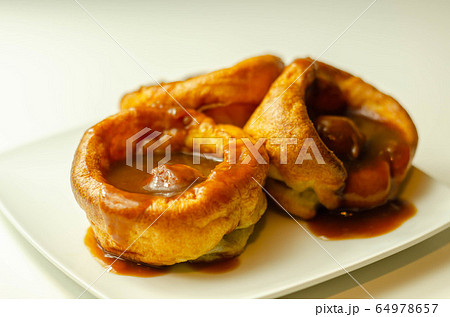 Traditional English Yorkshire pudding with 64978657