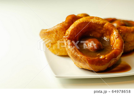 Traditional English Yorkshire pudding with 64978658