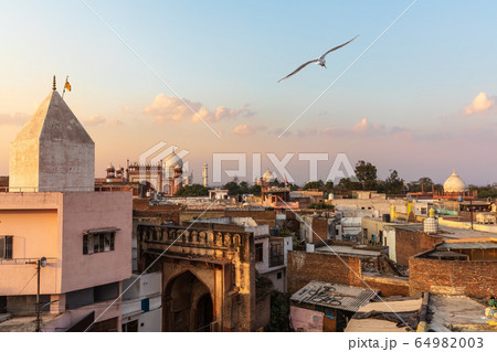 India, view on poor city Agra and Taj Mahal in the 64982003