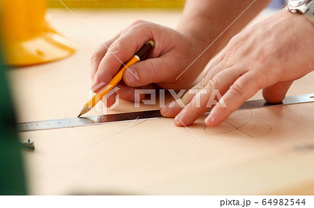 Arms of worker making structure plan Arms of worker making structure plan 64982544