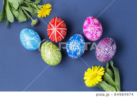 Easter eggs decorated with wax resist technique 64984974