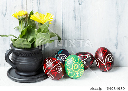 Easter eggs decorated with wax resist technique 64984980