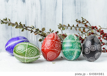 Easter eggs decorated with wax resist technique 64984981