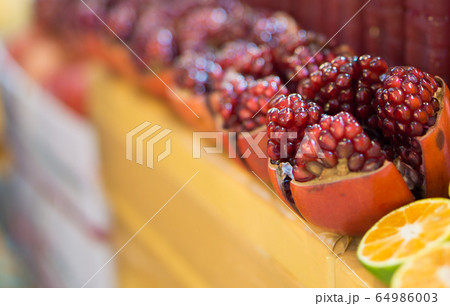 Ruby red on wooden table with selective focus. 64986003