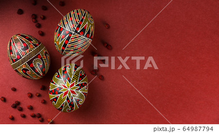 Easter eggs decorated with wax resist technique 64987794