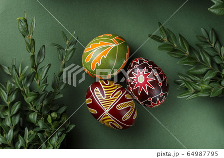 Easter eggs decorated with wax resist technique Easter eggs decorated with wax resist technique 64987795
