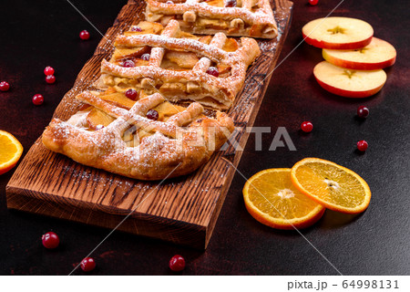 Delicious fresh pie baked with apple and pears 64998131