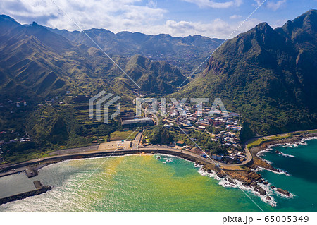 Drone view of Ruifang town and Yin and Yang Sea in New Taipei city 65005349