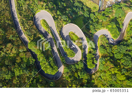 Drone view of winding road on mountain in Taiwan 65005351