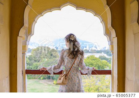 Portrait of young woman in Jaipur city palace in Rajasthan, India 65005377