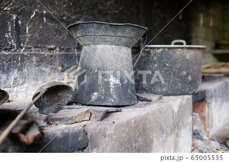 Old dirty pots in asian street kitchen 65005535