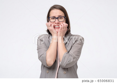Angry mad crazy woman screaming out having a panic 65006831