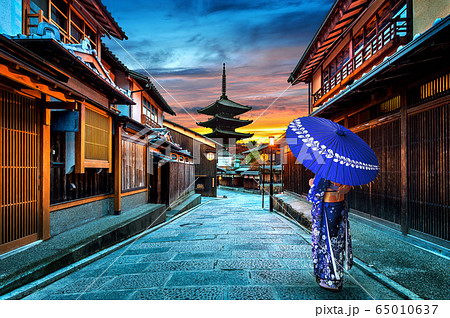 Asian woman wearing japanese traditional kimono at Yasaka Pagoda and Sannen Zaka Street in Kyoto, Japan. Asian woman wearing japanese traditional kimono at Yasaka Pagoda and Sannen Zaka Street in Kyoto, Japan. 65010637