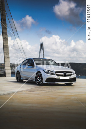 White sport sedan test drive at the seaside 65016346