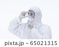 a doctor wearing protective suit. 65021315