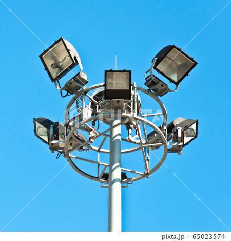 street light against blue sky 65023574