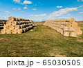 Yellow rolls of straw in the end of summer 65030505