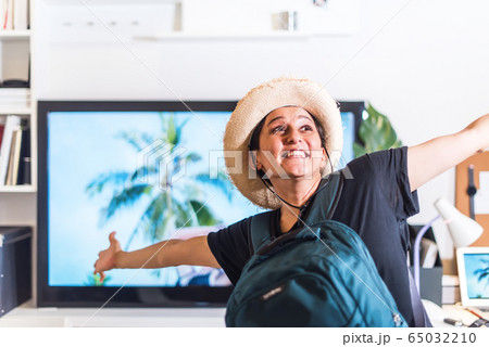 Young asian tourist backpack in hat wants travel 65032210