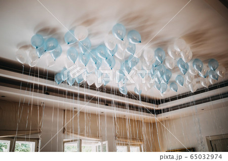 photo of helium balloons on a ceiling photo of helium balloons on a ceiling 65032974