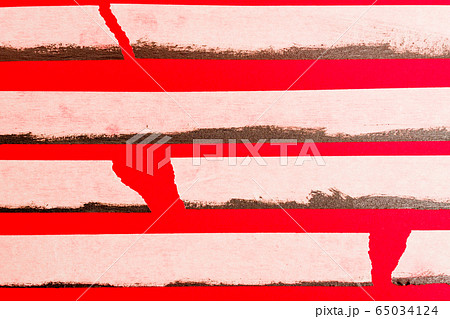 close up of an adhesive tape on red background 65034124