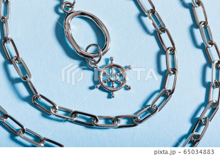 Top view of fashion jewelry and accessories on bright color background. Luxurious jewelry bijouterie and trendy concept. 65034883