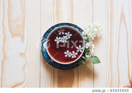 Cup of tea with flowers 65035930
