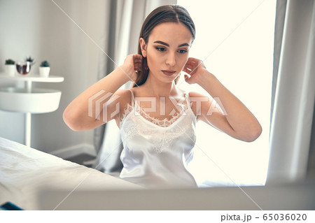 Caucasian lady with beautiful makeup spending time at home 65036020