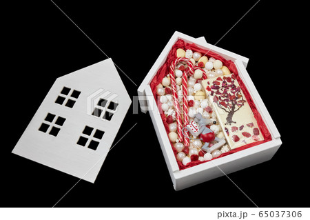 White box in the shape of a house White box in the shape of a house 65037306