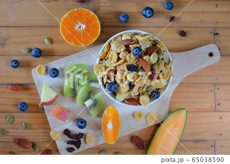 Healthy breakfast with cereal and fruit Healthy breakfast with cereal and fruit 65038590