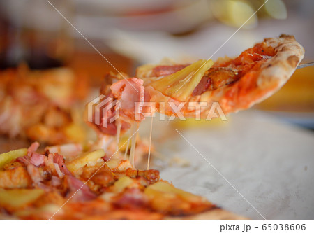 Delicious italian pizza served on white plate Delicious italian pizza served on white plate 65038606