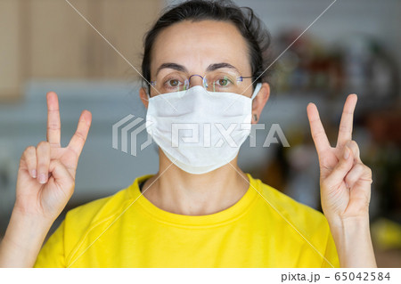 Young Spanish woman in protective sterile medical 65042584