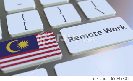 Remote Work text and flag of Malaysia on the computer keyboard. Telecommuting or telework related conceptual 3D rendering Remote Work text and flag of Malaysia on the computer keyboard. Telecommuting or telework related conceptual 3D rendering 65045385