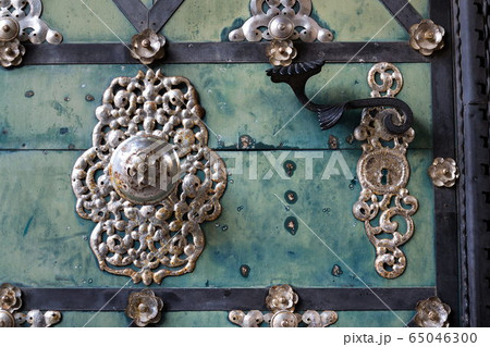 Decorative metallic handle on ironwork doors fittings, vintage light blue gate, azure color 65046300