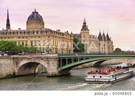 Seine River and Bateau Mouche in Paris, France 65046803