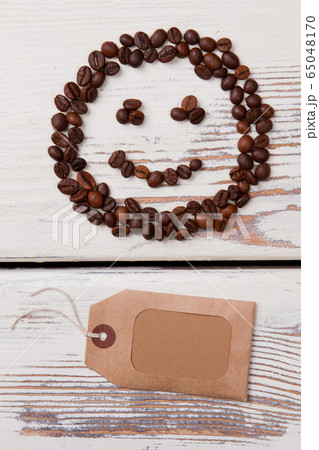 Coffee smile and blank paper tag. 65048170