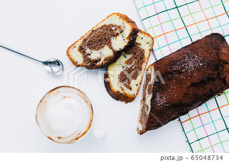 A piece of chocolate cake on a plate 65048734