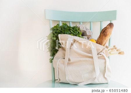 Groceries in reusable shopping bag 65051480