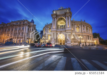 Ukraine, Odessa Oblast, Theater building illuminated at dusk 65051584