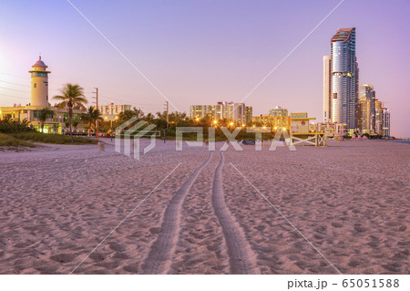 USA, Florida, Sunny Isles Beach, Illuminated buildings at beach USA, Florida, Sunny Isles Beach, Illuminated buildings at beach 65051588