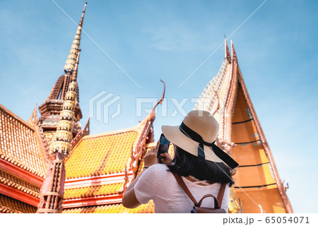 Tourist Woman Having Fun While Sightseeing in The Temple 65054071