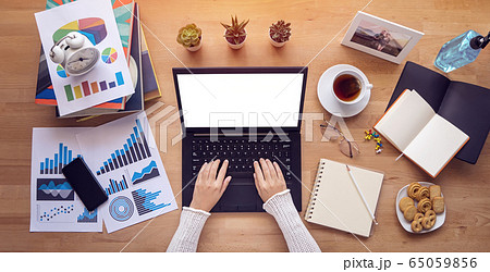 work from home. people typing on keyboard, working on laptop computer with blank white screen copy space during self isolation to avoid spreading illness transmission of COVID-19 Coronavirus outbreak. 65059856
