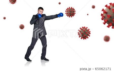 Businessman in boxing gloves punch the coronavirus cells. Businessman in boxing gloves punch the coronavirus cells. 65062171