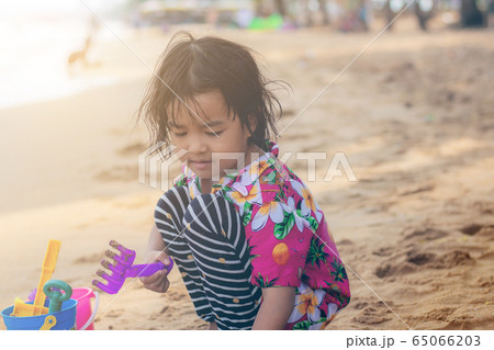 Children playing on beach. Children playing on beach. 65066203
