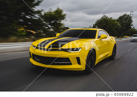 Yellow sport car with black tuning on it Yellow sport car with black tuning on it 65069922