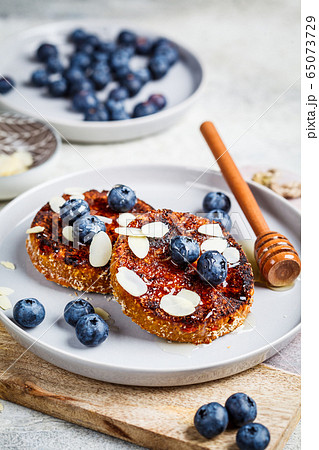 Tofu pancakes with blueberries and honey Tofu pancakes with blueberries and honey 65073729