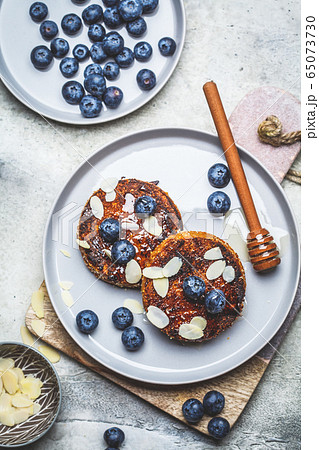 Tofu pancakes with blueberries and honey  65073730