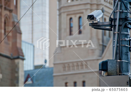 Surveillance CCTV street outdoor camera watching citizen Surveillance CCTV street outdoor camera watching citizen 65075603
