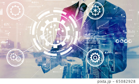 Automation concept with businessman holding a tablet 65082928