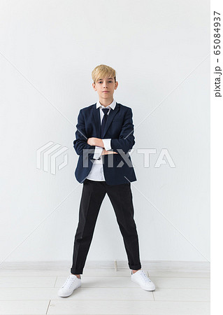 Teenage depression and puberty concept - Sad teenager portrait close up on white background. 65084937