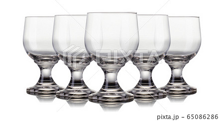 Set of empty glasses of light beer with foam isolated on a white background 65086286